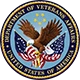 Seal featuring an eagle and flags, with text indicating the Department of Veterans Affairs